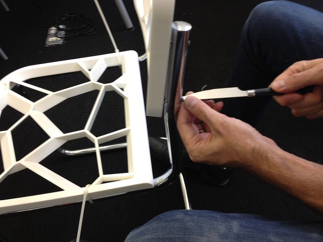 Assembling a 3D printed Chair with a butter knife