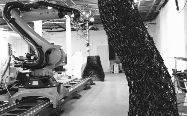 The arm in the printing facility robot-and-wall-build-with-branch