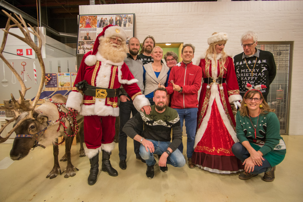 Community members meet Mr. and Mrs. Santa and their reindeer