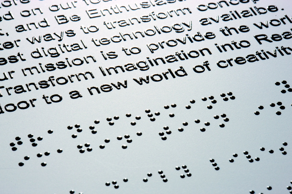 “Braille” by Roland DG Mid Europe Italia, licensed under CC BY 2.0