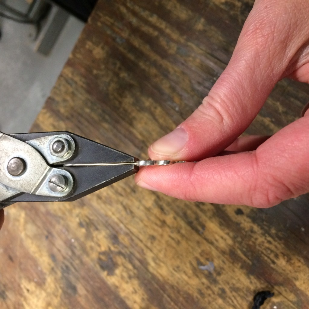 Straightening the wire with pliers