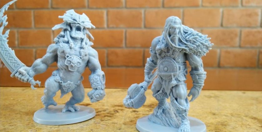 two 3D printed Norse god miniatures for the tabletop game Blood Rage