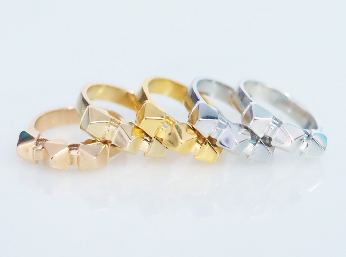 3d printed rings polished brass, polished bronze, 18k gold plated, rhodium plated, and polished silver