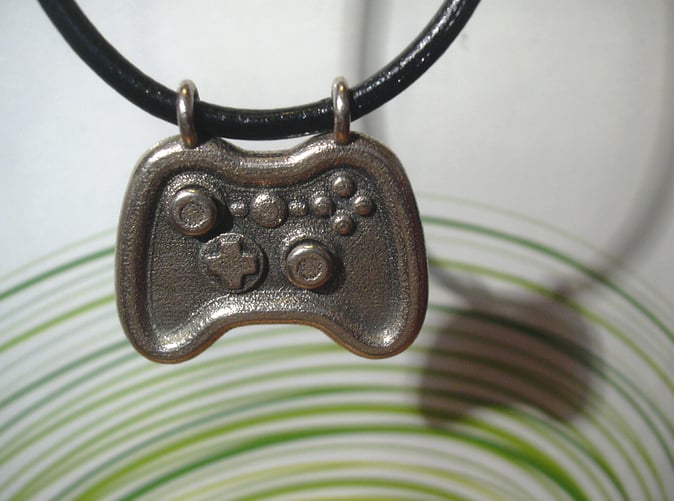 3d printed gamer pendant in stainless steel on Shapeways